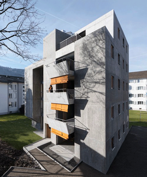 gus wüstemann architects' low-cost concrete housing block in zurich surburb