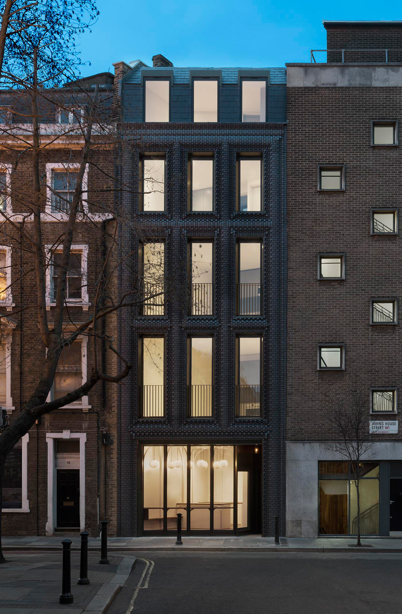 bureau de change architects clads london building in matte blue brick façade