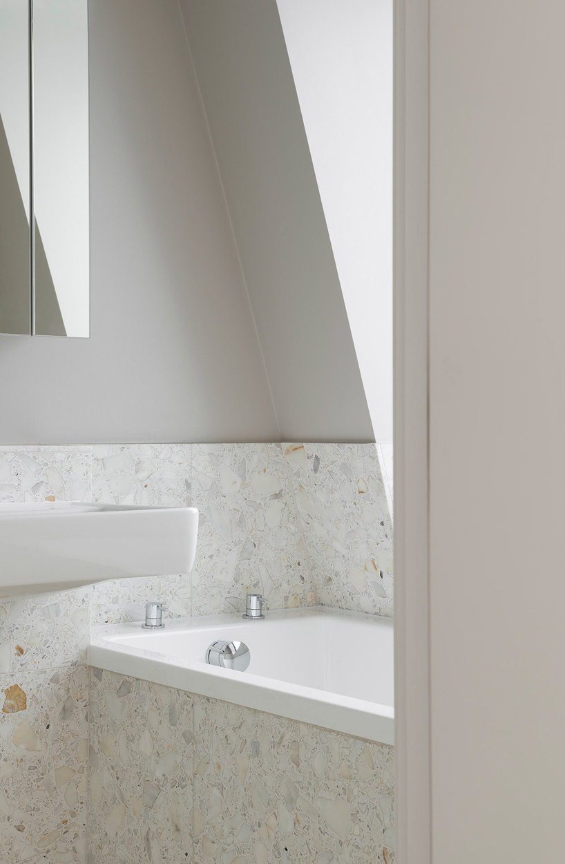 bureau de change architects clads london building in matte blue brick façade