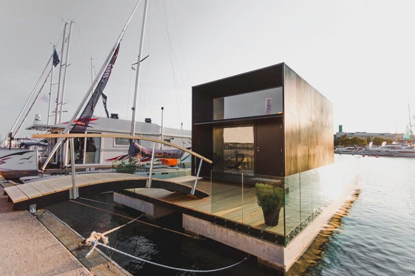 kodasema's tiny prefab house floats on water through integrated pontoons