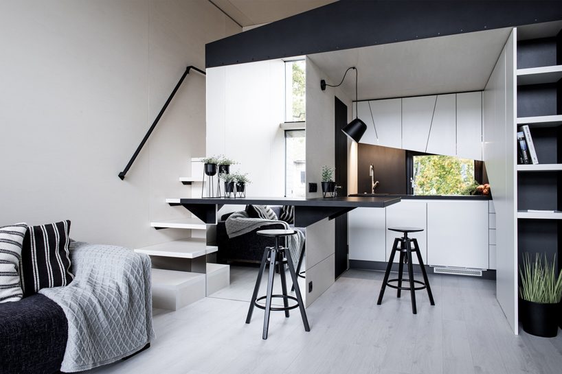kodasema's tiny prefab house floats on water through integrated pontoons