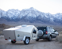 the polydrop trailer is a lightweight portable living space for comfortable travelling