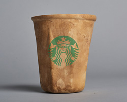 https://static.designboom.com/wp-content/uploads/2019/03/new-starbucks-coffee-cup-biodegradable-creme-designboom-250.jpg