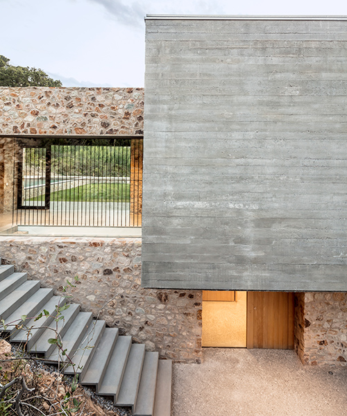 casa 1510 by nordest arquitectura emerges from the mountainous landscape of spain