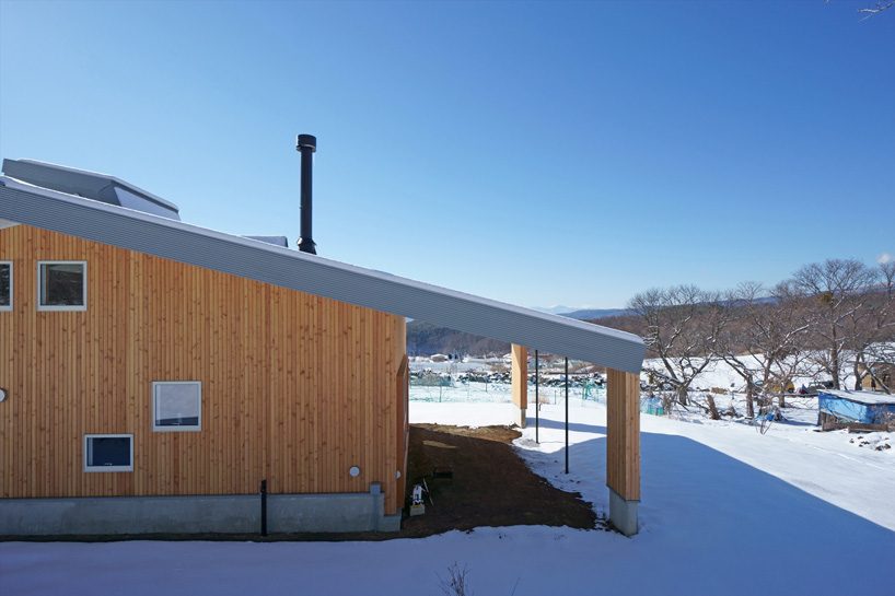 yuji tanabe builds second pettanco house with giant dormer in the japanese alps