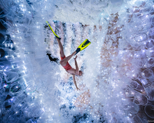 this bubbly cosmic cave is an 'instagram trap' made from 18,000 recycled plastic cups