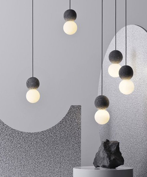 studio davidpompa combines volcanic rock and opal glass in new 'origo' collection