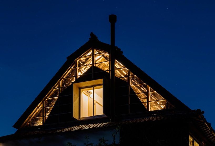 tadashi yoshimura breathes new life into thatched sloping roof of japanese residence