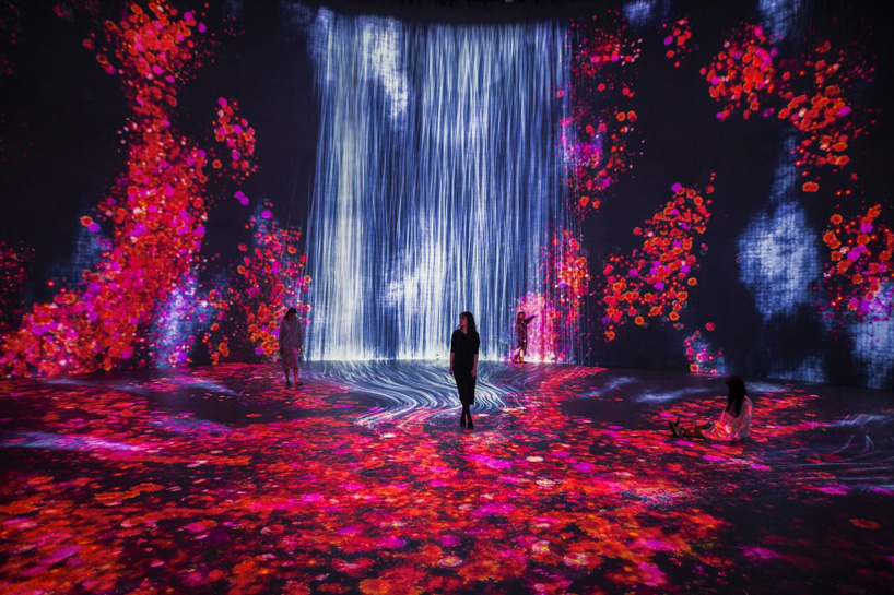 teamlab fills former oil tanks with 'digital universe of water particles' in shanghai