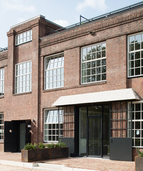 wenink holtkamp's factory conversion in the netherlands preserves industrial character