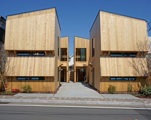 yuji tanabe builds commercial block of twin wooden buildings in kamakura, japan