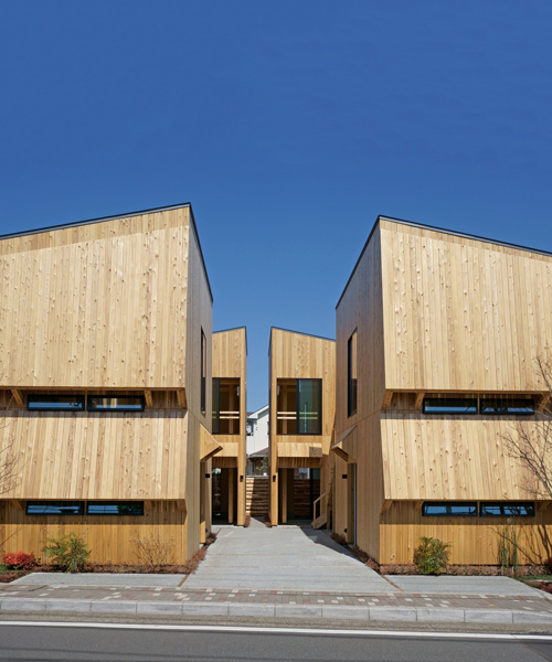 yuji tanabe builds commercial block of twin wooden buildings in kamakura, japan