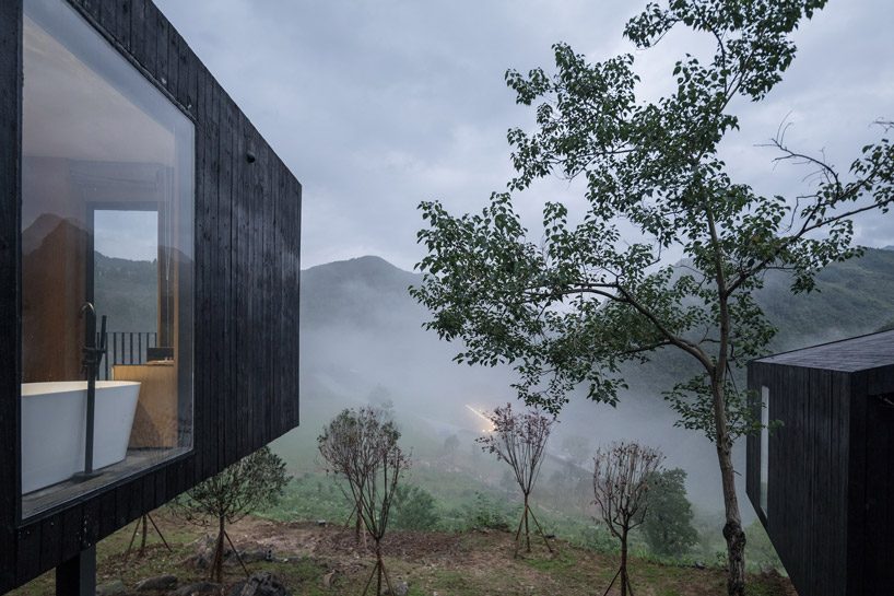 Zjjz Builds Charred Timber Volumes In Rural China For Woodhouse Hotel