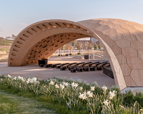 wooden pavilion comprises robotically assembled segments that fit together like a 3D puzzle