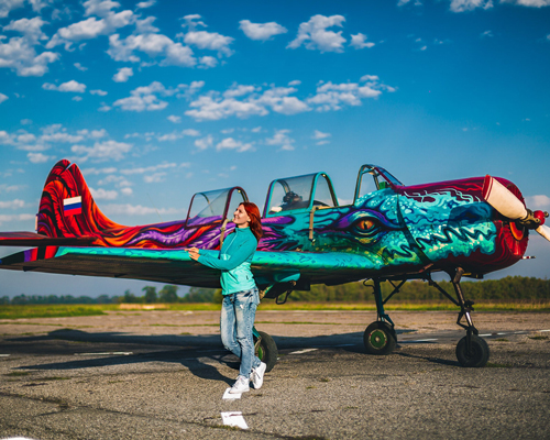 graffiti airplane dragon takes to the skies (a spray painted yak 52)