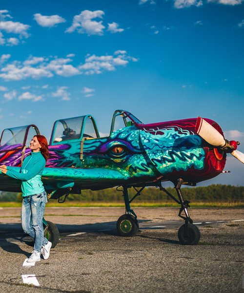graffiti airplane dragon takes to the skies (a spray painted yak 52)