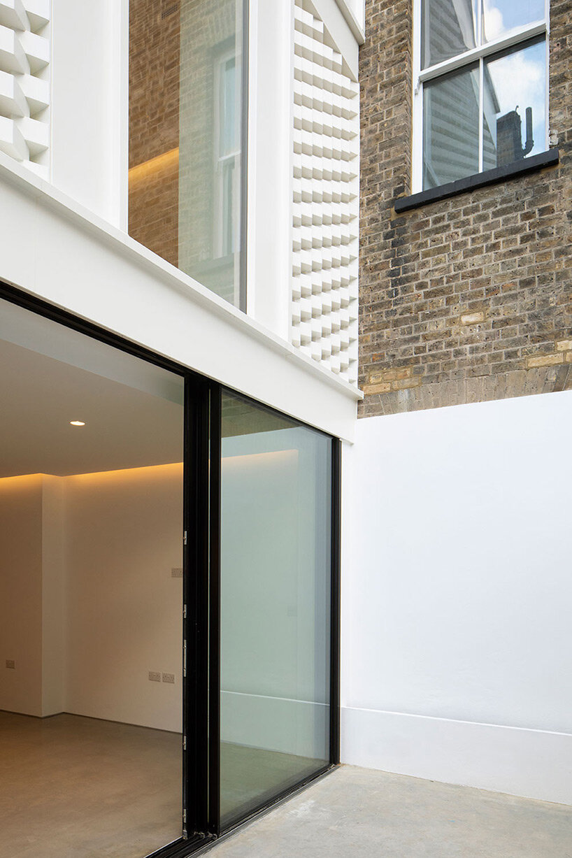 DHaus blends english mews + japanese courtyard typologies for 'woodsome road' in london