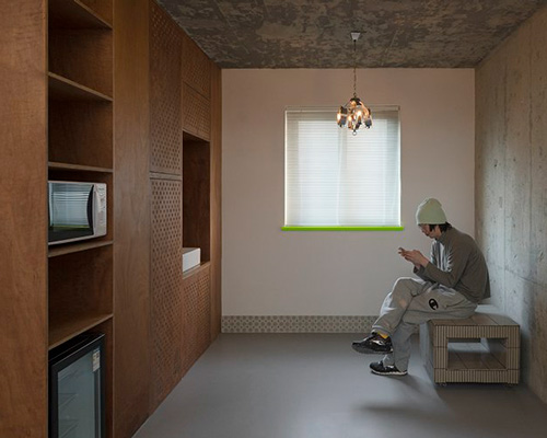 archive transforms artist's shanghai apartment into painter's quarters