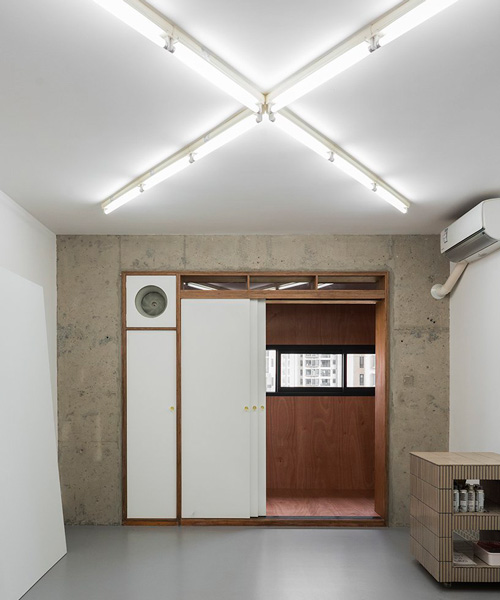 archive transforms artist's shanghai apartment into painter's quarters