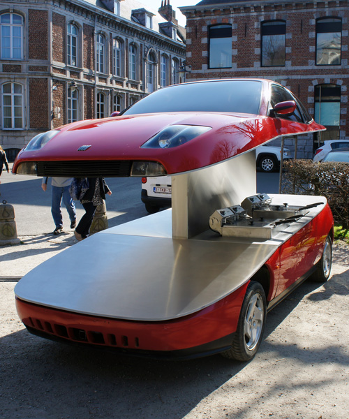 benedetto bufalino cuts fiat coupé horizontally to serve french fries on the street