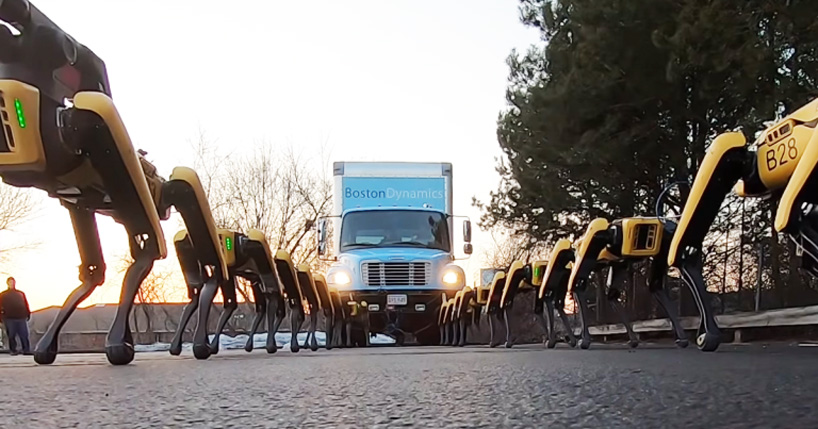 boston dynamics employs a pack of robot dogs to tow this huge truck designboom