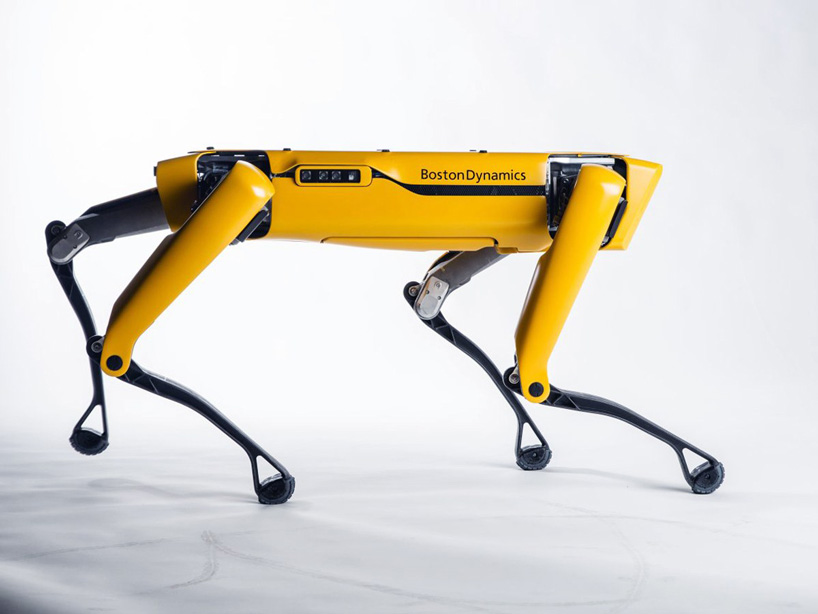 boston dynamics employs a pack of robot dogs to tow this huge truck designboom