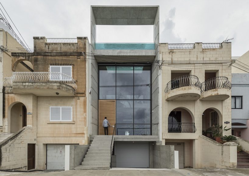 architrend tops house B in malta with see-through swimming pool