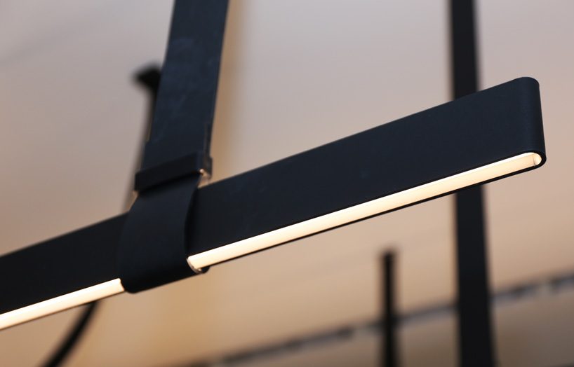 pinball corridor introduces visitors to flos' iconic designs and new pieces at salone del mobile