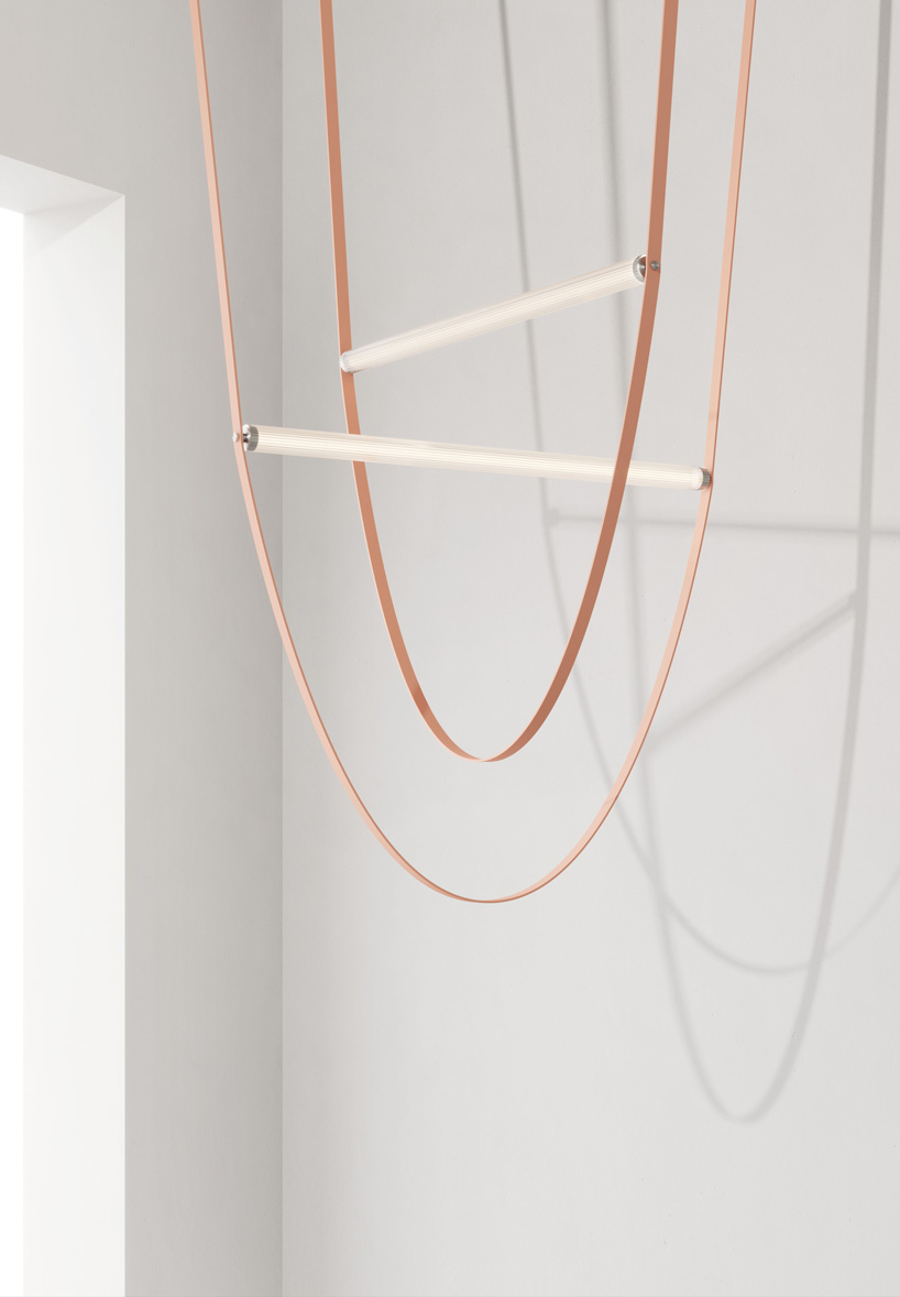 pinball corridor introduces visitors to flos' iconic designs and new pieces at salone del mobile