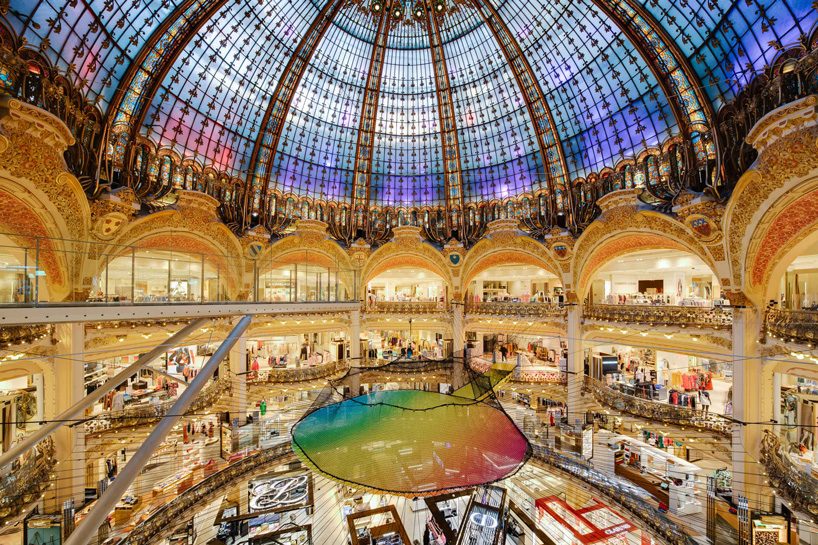 Suspended Rainbow Net Stretches In The Middle Of Galeries