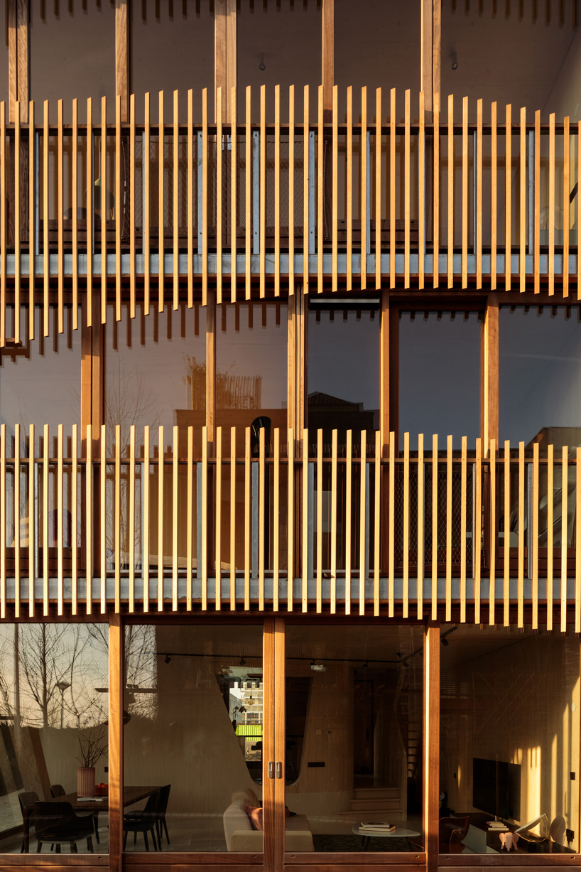 GG-loop clads maritime-inspired apartment complex in waves of wooden slats designboom freebooter