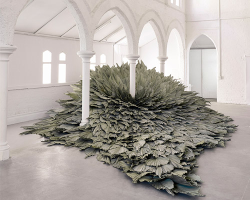 giant botanical installation by loose leaf transforms a former church hall in australia