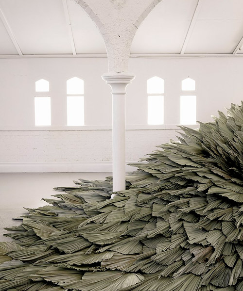 giant botanical installation by loose leaf transforms a former church hall in australia