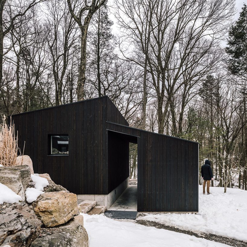 miguel quismondo builds small pavilion with charred wood and a polycarbonate façade