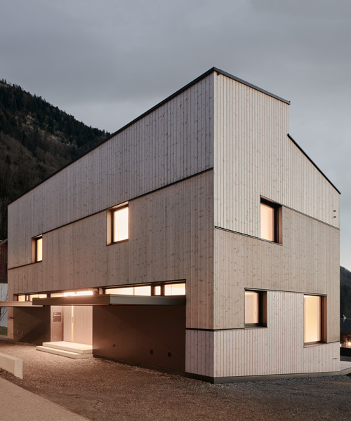 MWarchitekten constructs semi-detached timber house on austrian hillside