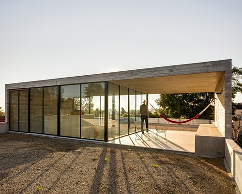 casa sierra fría by PPAA features a rooftop retreat that overlooks mexico city