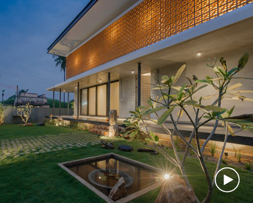 STO.M.P applies terracotta façade and earthy materials to 'house in a grove' in india