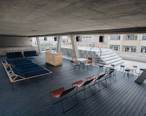 studio91 applies exposed concrete and steel to form the malaquita rooftop in mexico city