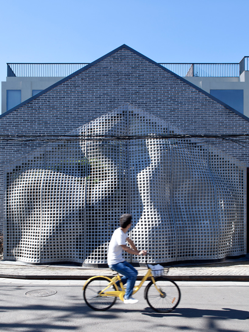 cultural space in beijing complete with digitally fabricated façade of high fiber concrete