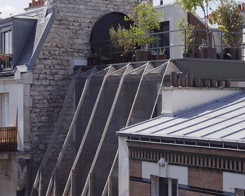 WRA forms a pleated steel mesh façade for parisian residence