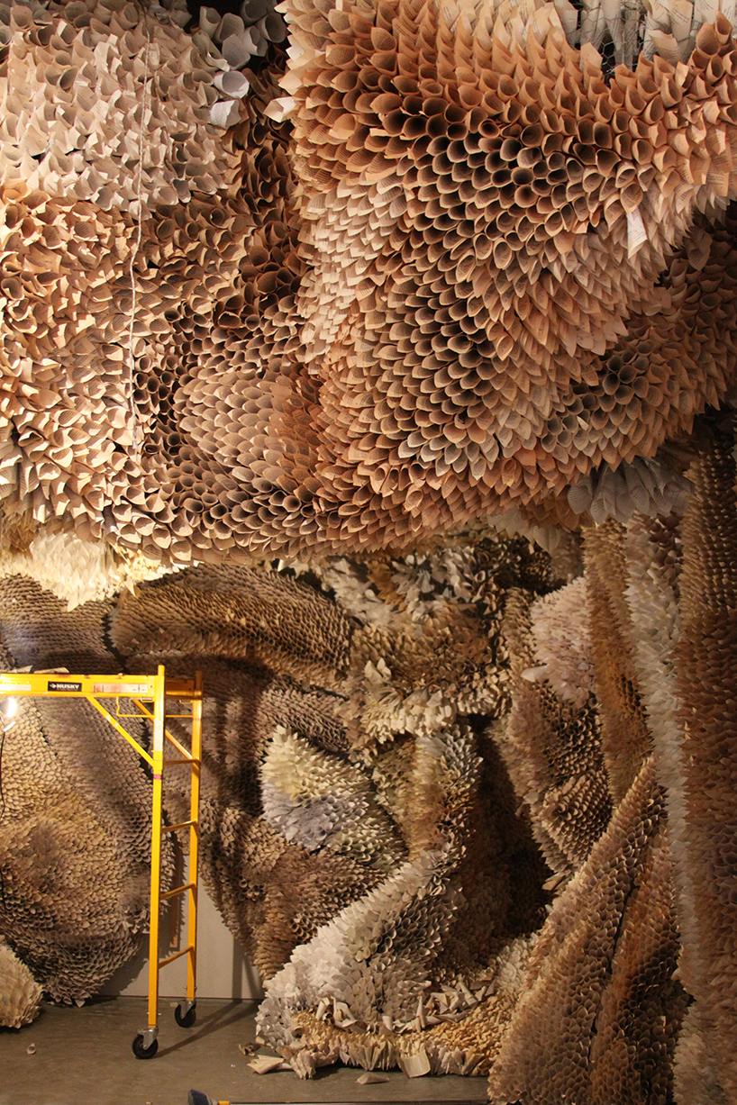 samuelle green uses paper and chicken wire to intricately weave an otherworldly cove