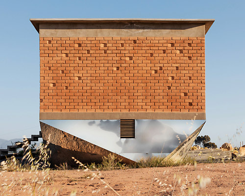 santos bolivar architects scatters rammed-earth hotel across mexican landscape