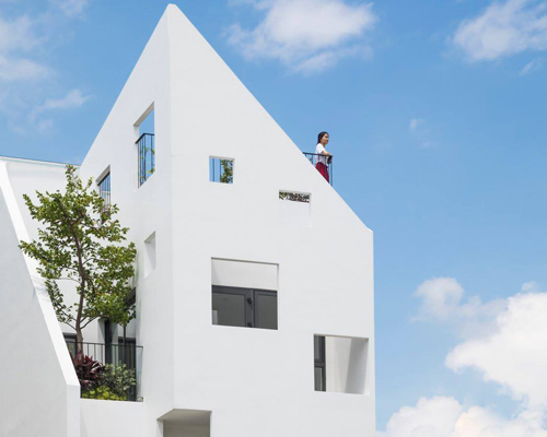 6717 studio completes liên thông house in vietnam with perforated façade