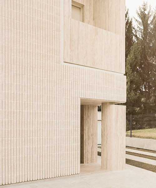 italy's 'house of the archeologist' expresses history through materiality