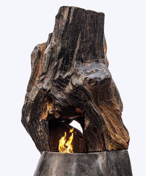 'ascendance' is a petrified wood fireplace designed by metaplace industries