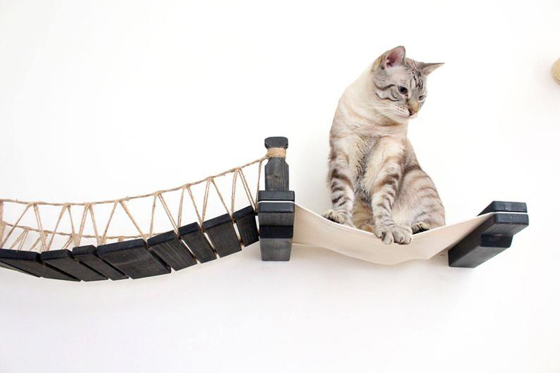 wooden, cushioned mini houses and beds for cats help them relax and sleep  well