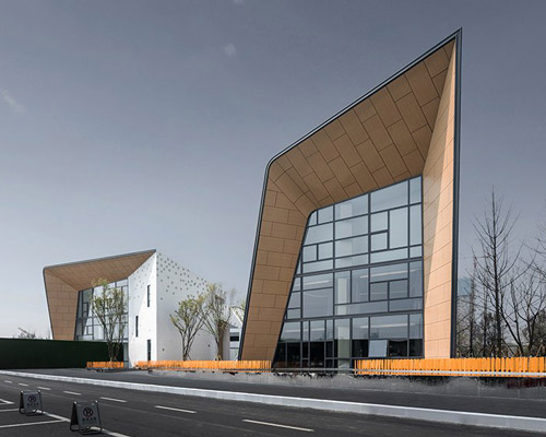 challenge design folds a metal façade over the 'park legend kindergarten' in china