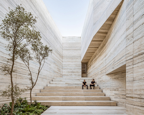 a quarry and a warehouse designed by esrawe studio showcase material library in guadalajara