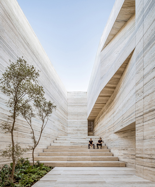 a quarry and a warehouse designed by esrawe studio showcase material library in guadalajara