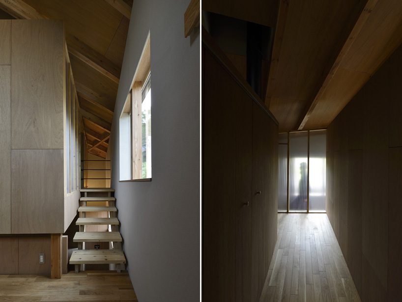 hiroshi horio architects stacks two wooden boxes for family house in japan